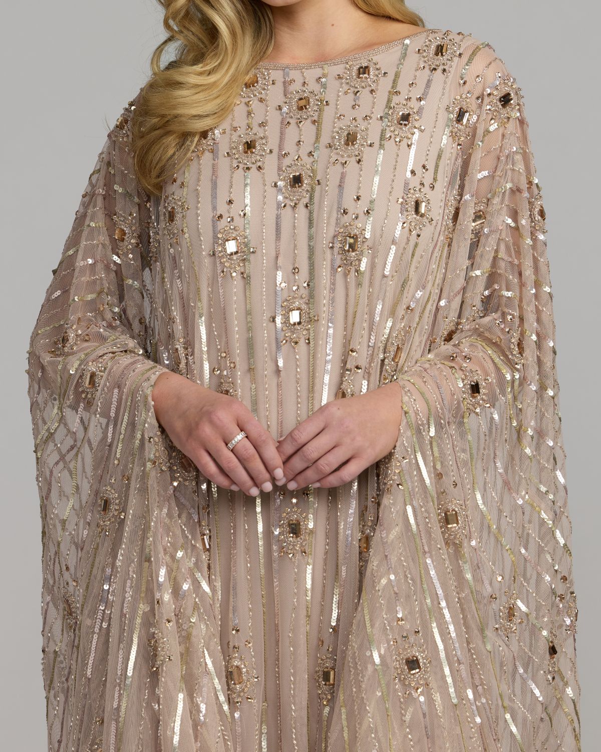 Mac Duggal #9526 champagne beaded boat neck kaftan gown close-up