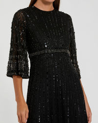 Mac Duggal #23045 black high neck embellished gown with 3/4 sleeves close-up