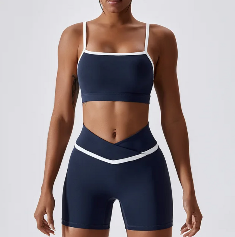 Give your off-duty wardrobe a new lease of life with this monochrome gym crop top and shorts set. This cropped cami top with hidden padding is brought to you in a monochrome grey and white style with white piping straps and a seamless design. This gym fit set is everything you need for your everyday errands, pilates or for your gym session.  Suitable for yoga, exercise, fitness, running, any type of workout, or everyday use. this sportswear set is soft, comfortable and flattering navy