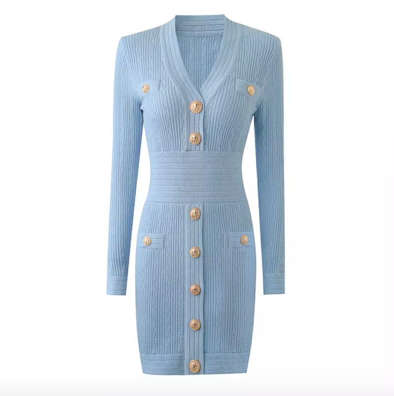 The Natalynska Sasha dress is an elegant long-sleeved mini dress with deep plunging neckline, and gold button detail. This sexy, sophisticated dress balmain inspired baby blue