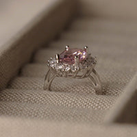 Pink oval sapphire halo cocktail ring detail