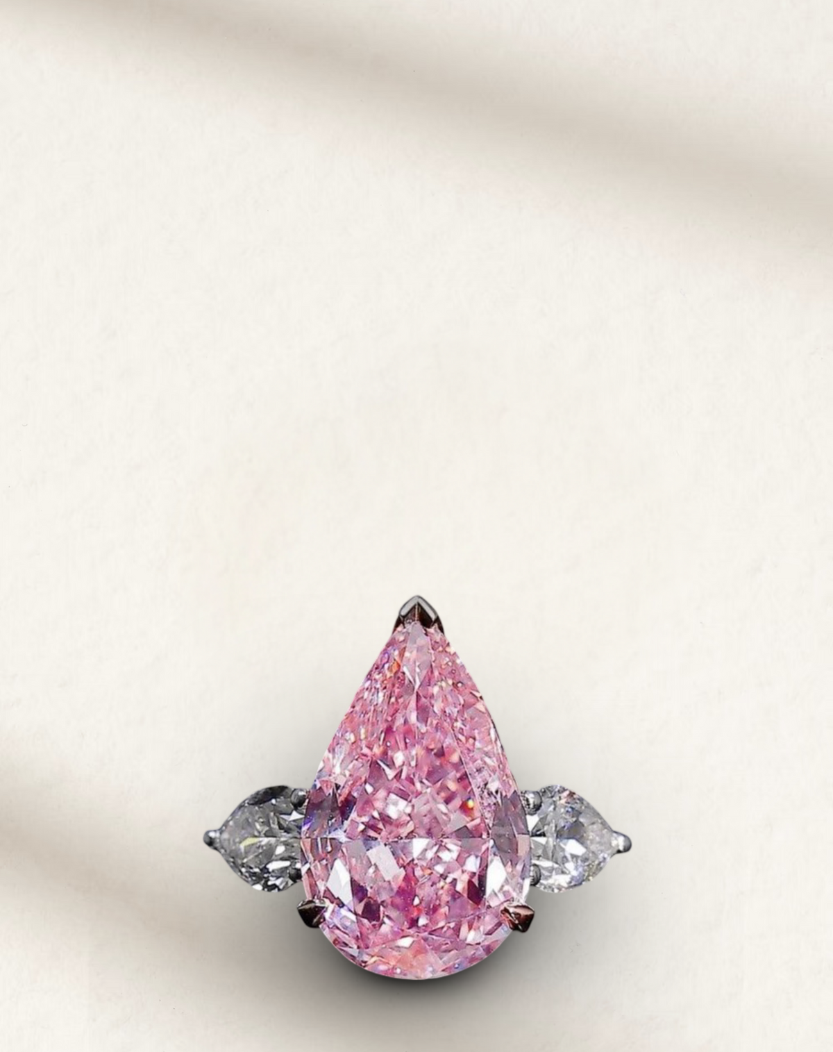 A stunning 8 Carat, Pear Cut, Fancy Vivid Pink, created diamond cocktail ring is inspired by Anna Kournikova's engagement ring.