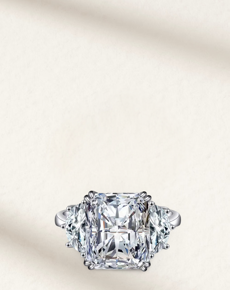 Lab-created 9 carat radiant cut cocktail ring with a bold rectangular gemstone set in a polished band