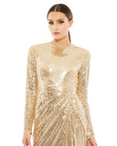 This elegant Mac Duggal, long, gold, hand-sequined gown is a fashion-forward choice for any formal affair. With a high round neckline, long sleeves, and a floor-grazing skirt, this modest silhouette is accented by a draped skirt and inset waist detail. Sleeves feature hidden zippers for ease of dressing. This elegant evening dress is the perfect dress perfect for proms, black-tie affairs, weddings and special events close up
