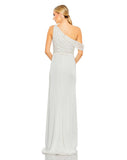 Sensual and elegant, draped off-the-shoulder sleeves are this “It” design detail. This ivory, asymmetrical gown incorporates the sleeves as part of its beautiful bodice that’s embellished with pearlescent beads and flower-shaped sequins. A trend-forward play on vintage dress closures, covered buttons create a path leading to the top of a sexy leg slit. This is a perfect gown for weddings, second dresses and engagement parties back view