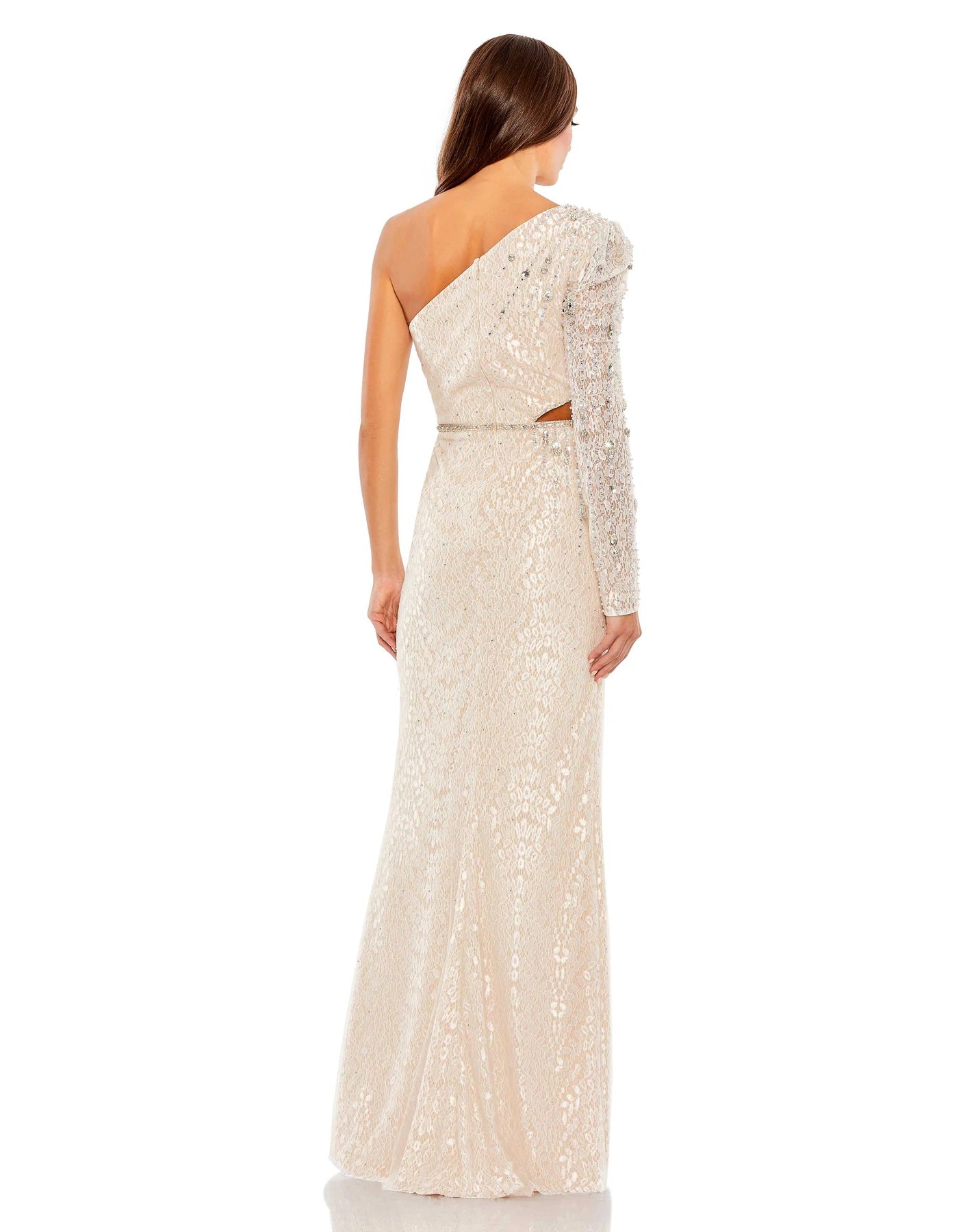 This very special evening gown is perfect for engagement parties, second dresses and weddings! Crafted in an elegant nude/ivory fabric with asymmetrical sleeve detail, this gorgeous gown has a hint of sexiness with cut out detail at the hip and one thigh high split back view