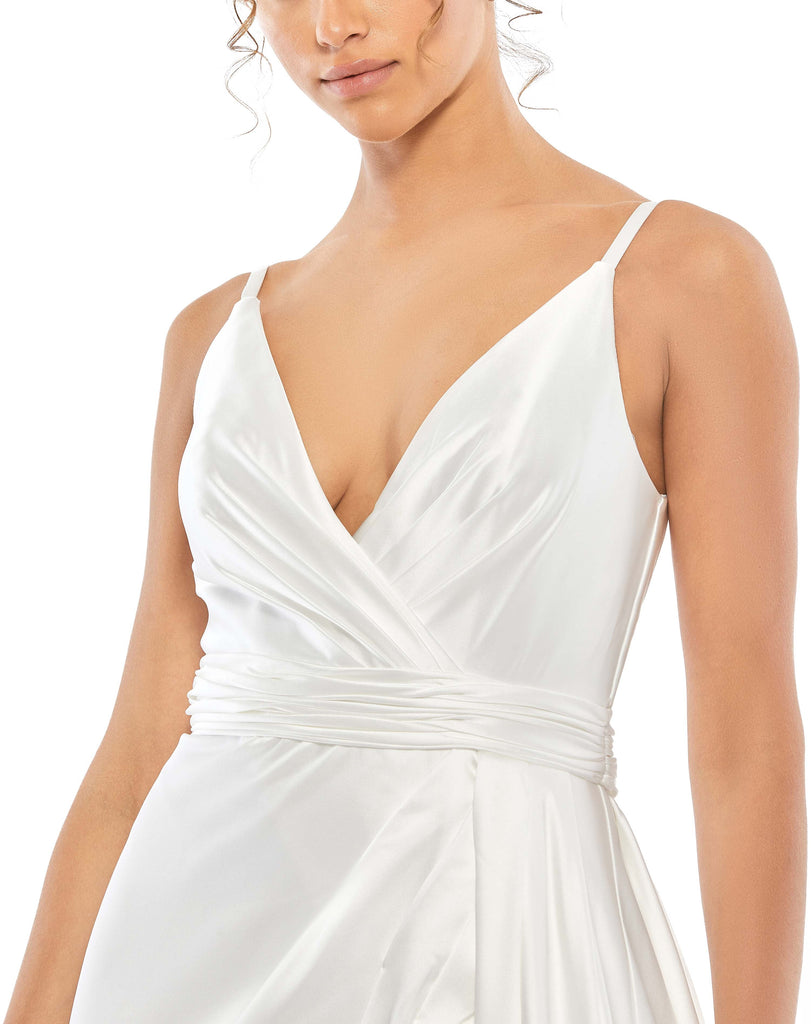 This stunning, white, satin v-neck gown with a thigh-high front slit is a beautiful, full-length evening dress perfect for proms, black-tie affairs, weddings and special events! close up 