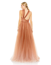 This very special, nude tone, Mac Duggal, floor-length, ball-gown in delicate carmel ombre is a evening dress destined for black-tie, red carpet and very special events! Made with beautiful layers of soft-tulle and an asymmetric neckline. This elegant formal dress is picture perfect and will have you looking every inch a princess back view