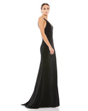 This vampy, Jessica Rabbit of a dress is a floor-length, strapless black, bodycon, fitted gown with a plunging V shaped bust, banding at the waist to cinch you in and one sexy thigh high split for added drama, finished perfectly with a little train. With stunning strap detail at the back, this evening dress is just as show-stopping from the back as it is from the front! This gown is perfect for proms, black-tie affairs, weddings and special events side view