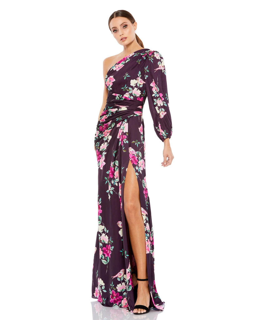 This stunning one-sleeve charmeuse floral-print gown in gorgeous plum colour is completed with a high slit and hand-sewn ruching to accent the waist is the perfect dress for Summer weddings and special events!