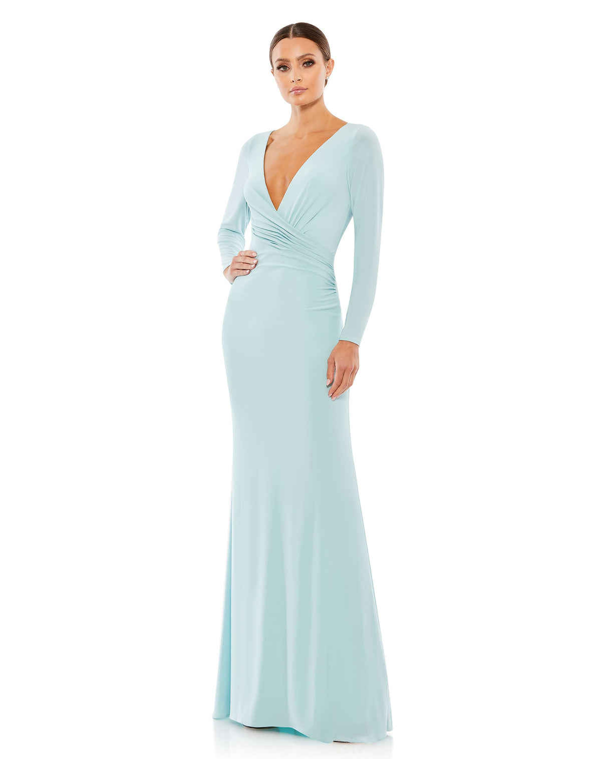 This elegant Mac Duggal powder-blue, evening dress is a beautiful, long, simple and sleek, chic jersey gown. Cut with a curve-hugging fit, the dress is fashioned with a deep surplice neckline, long sleeves and pleating at the waist. This gown is perfect for proms, black-tie affairs, weddings and special events!