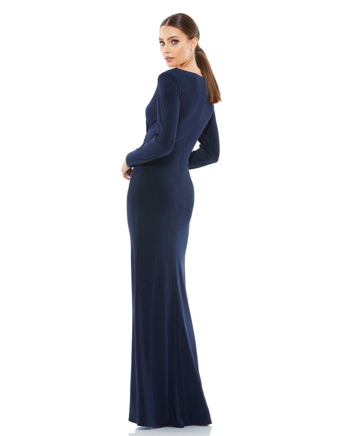 This elegant Mac Duggal midnight-blue, evening dress is a beautiful, long, simple and sleek, chic jersey gown. Cut with a curve-hugging fit, the dress is fashioned with a deep surplice neckline, long sleeves and pleating at the waist. This gown is perfect for proms, black-tie affairs, weddings and special events! side