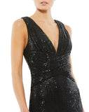 This elegant Mac Duggal, long, black, floor-length sequined gown with a plunging v-neckline, wrap waist, and a thigh-high slit. This elegant evening dress is the perfect dress perfect for proms, black-tie affairs, weddings and special events! close up