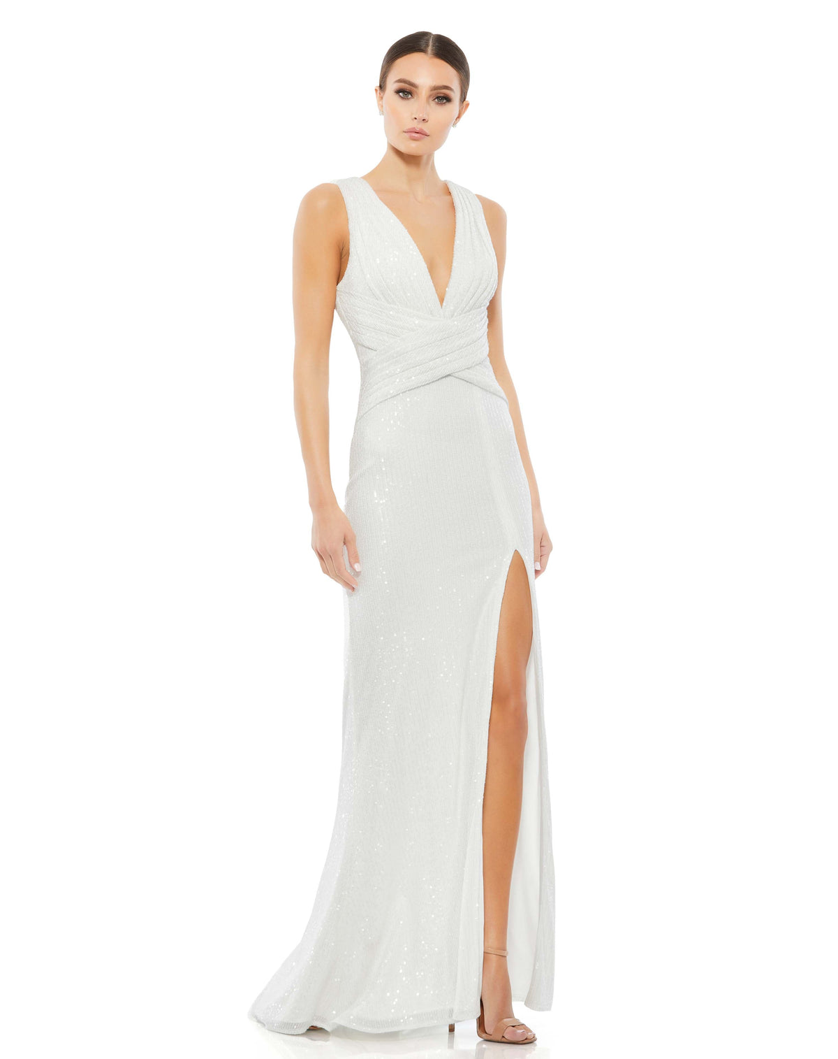 This elegant Mac Duggal, long, white, floor-length sequined gown with a plunging v-neckline, wrap waist, and a thigh-high slit. This elegant evening dress is the perfect dress perfect for proms, black-tie affairs, weddings and special events!