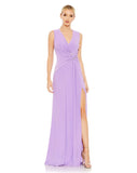 This elegant Mac Duggal floor-length, lilac, short sleeve, evening dress is a beautiful, long, simple and sleek, jersey gown with gathering at the waist finished with a rhinestone buckle and a sexy leg slit to create easy and simple movement. This gown is perfect for proms, black-tie affairs, weddings, brides and special events!