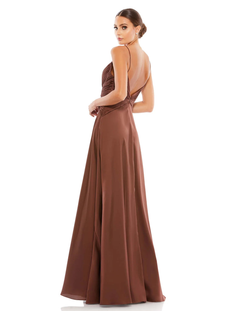 This soft and feminine, satin floor length chocolate brown mocha coloured evening gown is Grecian goddess inspired! With a twist front and sexy thigh high split, this simple yet show-stopping gown is understatedly sexy. This is the perfect gown for special occasions, weddings and Summery parties! back view