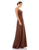 This soft and feminine, satin floor length chocolate brown mocha coloured evening gown is Grecian goddess inspired! With a twist front and sexy thigh high split, this simple yet show-stopping gown is understatedly sexy. This is the perfect gown for special occasions, weddings and Summery parties! front side view
