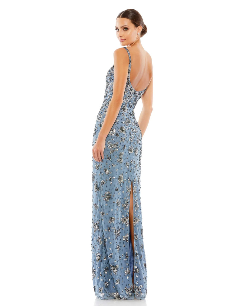 This stunningly elegant, floor-length, blue/slate grey tone evening dress is a strap sleeve column gown accented with jewel and bead embellishment. This bodycon, form-fitting evening gown is perfect for proms, black-tie affairs, weddings and special events side view
