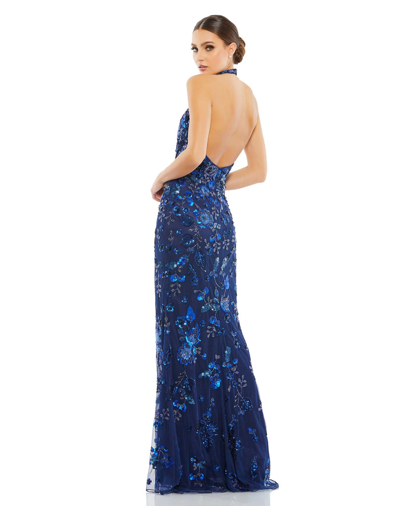 This elegant Mac Duggal short-sleeved, floor-length, halterneck, navy blue crystal and bead embellished evening dress is a stunning formal gown for your special occasions! With a  beautiful V neckline and a column style fit and low back detail, this dress will truly have you feeling picture perfect back view