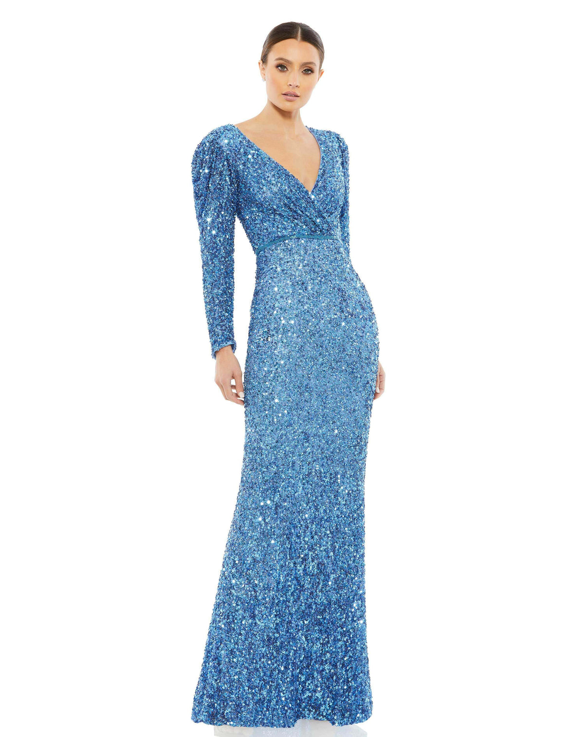 This stunning Mac Duggal elegant long-sleeved, French Blue, sequin, evening gown is a beautiful, full-length sequin-stitched column gown. The demure design is styled with a pleated surplice neckline, long sleeves with puff shoulders, a hand-beaded waist, and a sweep train. It’s a gorgeous show-stopping choice for your next formal event. 