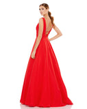 This very special, A-line red-carpet style, evening gown in rich-red fabric with a plunging neckline is a show-stopping dress with a dramatic train. This strapless, elegant formal dress is picture perfect and will have you looking every inch a princess. Perfect for proms, Summer formals and wedding guests! side view