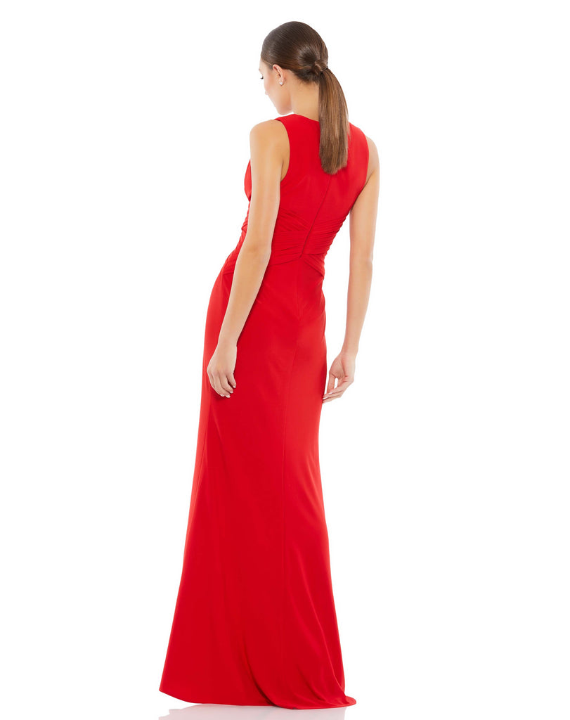 This elegant red Mac Duggal long deep V-neckline, sleeveless shoulders, a pleated, crisscrossed waist, and a sexy slit. It’s minimalist elegance at its finest. This special occasion dress is perfect for proms, black-tie affairs, weddings and special events! back