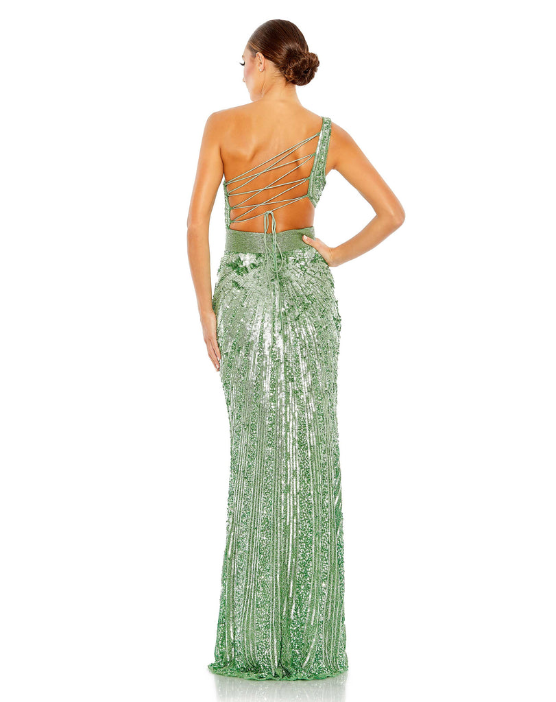 This elegant Mac Duggal, long, sequin sage green, asymmetric shoulder gown with sexy cut out detail at the waist, and a smouldering high slit is a met gala inspired gown for a very special occasion! This elegant evening dress is the perfect dress perfect for proms, black-tie affairs, wedding guest and special events back view