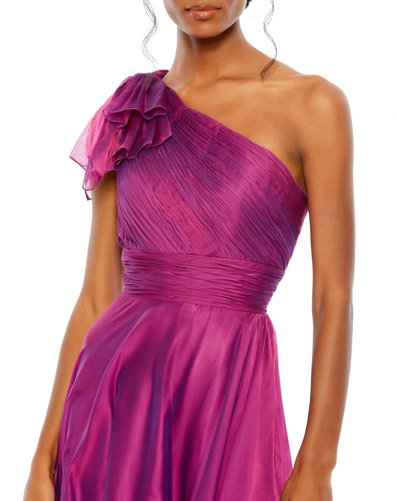 This elegant Mac Duggal one-sleeved raspberry, dress is a stunning formal gown for special occasions. With beautiful draped asymmetric detail across one shoulder and an empire bust together with a flower skirt, this elegant gown will truly have you feeling like the belle of the ball front view