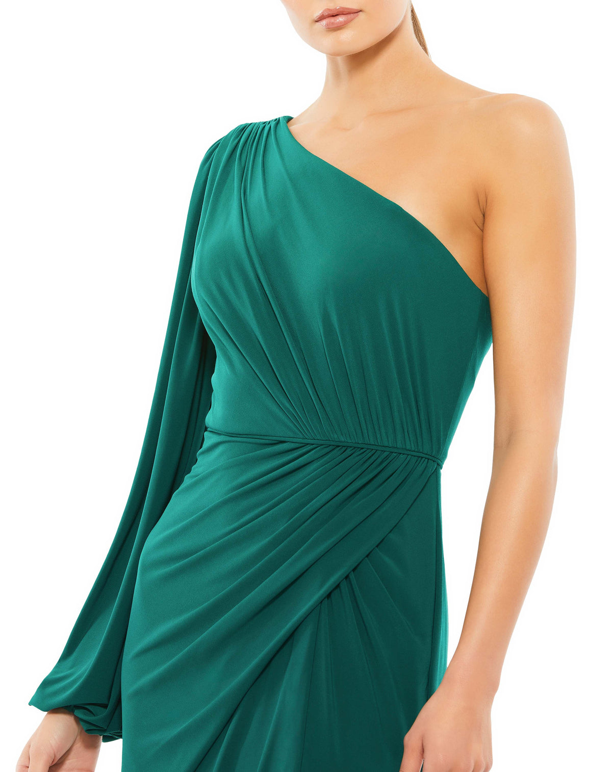  cThis stunning Ieena for Mac Duggal elegant, emerald green long-sleeved, evening gown is a beautiful, full-length evening dress with asymmetric detail. With one sexy-thigh high split, dress is perfect for proms, black-tie affairs, weddings and special events!l close up