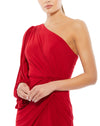 This stunning Ieena for Mac Duggal elegant, red long-sleeved, evening gown is a beautiful, full-length evening dress with asymetric-sleeve detail. With one sexy-thigh high split, dress is perfect for proms, black-tie affairs, weddings and special events! front close up