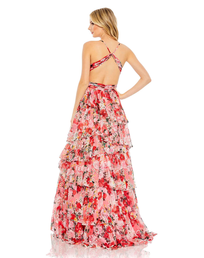 This very special, Summery, sexy-cut out evening gown with gorgeous floral print is a show-stopping dress with an exposed back back and a dramatic skirt. This short-sleeved, elegant formal dress is picture perfect and will have you looking every inch a princess. Perfect for proms, Summer formals and wedding guests side view