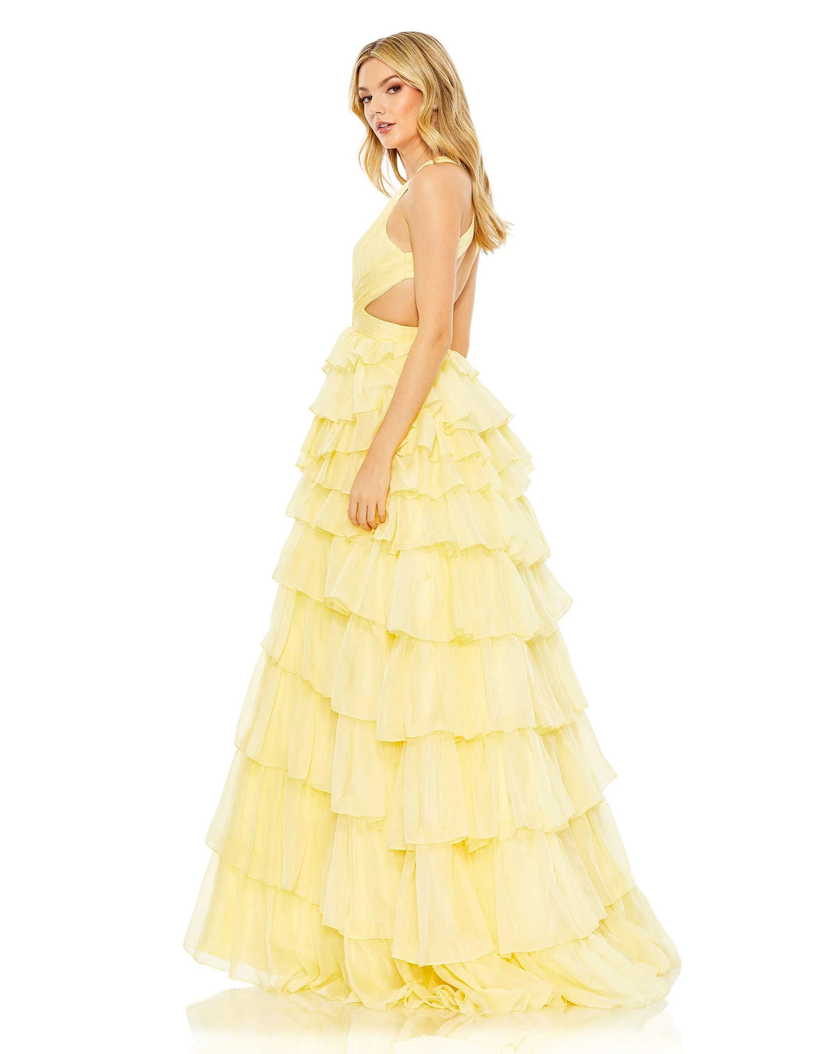 This show-stopping, lemon yellow, prom dress is styled with a pleated bodice with a deep neckline, waist cutouts, and crisscross centre providing the perfect amount of cleavage. With decadent layers of graduated ruffles fill out the full skirt for a design that’s festive and flirty, perfect for Summer weddings and parties side view