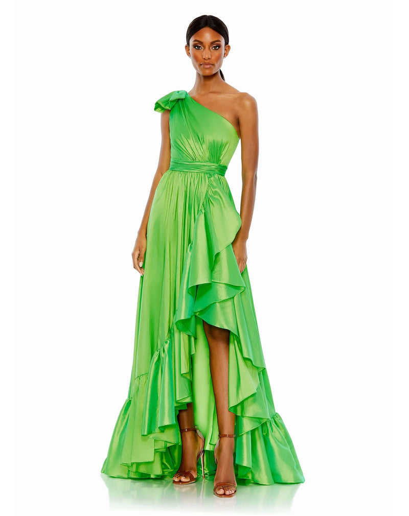 This elegant Mac Duggal floor-length, iridescent spring green taffeta evening gown is styled with a bow-topped shoulder, a cascading oversized ruffle, and a high-low hem. Pleats and gathers add pretty texture to enhance the look. This sophisticated asymmetric shoulder gown is perfect for proms, black-tie affairs, weddings, brides and special events!