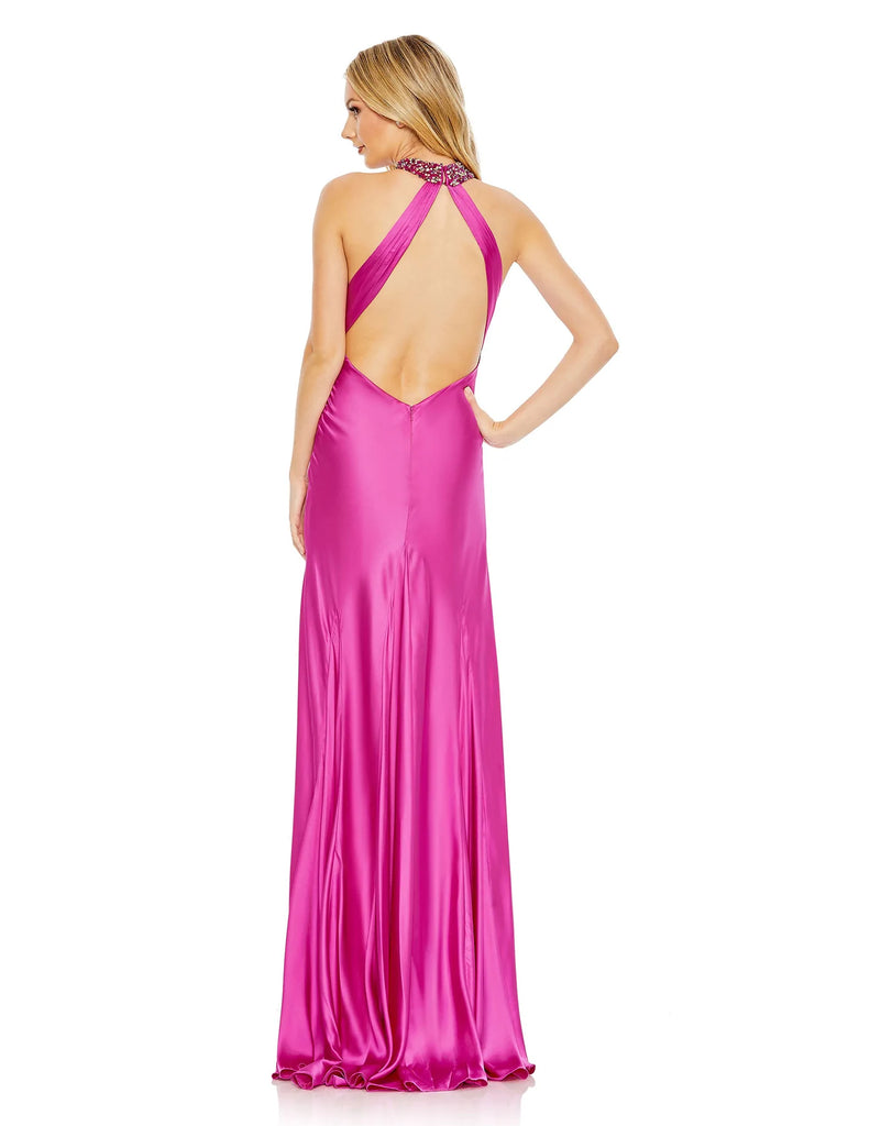 This elegant hot pink fuchsia coloured formal dress is picture perfect for proms, weddings and special occasions! With an elongating column style fit and halterneck, crafted with liquid satin fabric, this gown is both elegant and sophisticated. This floor length dress features a dazzling embellished halter-neck collar, with a touch of gathering and a slender keyhole cutout before it finishes with a revealing back and glamorous sweep train back view