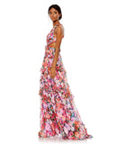 This elegant Mac Duggal, long, short-sleeved, ruffled, multi, tiered dress is perfect for Summer proms and wedding guests! This dress with short ruffled sleeves and a sexy cut-out detail make it so very stunning! Inspired by colourful floral blooms, this dress is crafted from translucent chiffon populated with romantic roses back view