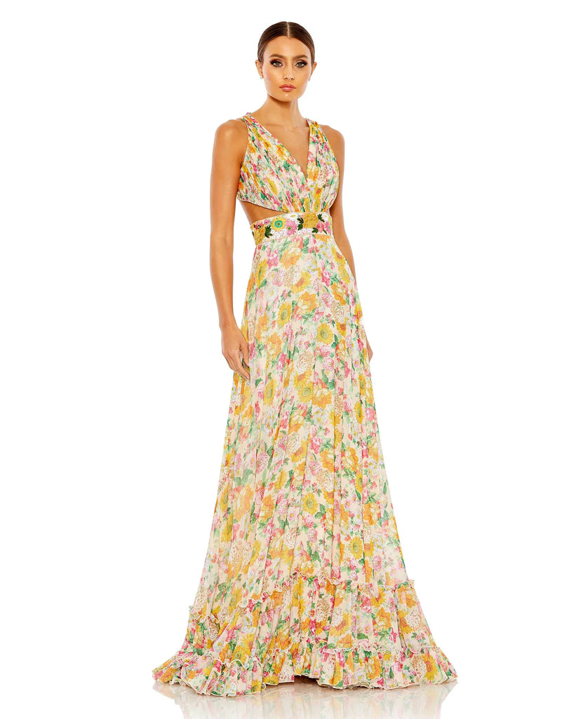 This show-stopping, floral print, floor length evening gown with sexy side cut-out detail features pleating at the bust tapering down into a hand embroidered waist followed by a full skirt with tiered detail at the hem. With elegant strappy tie-up detail at the back, this gown exposes a little sexy back for all your photos to be truly sensational from any angle! This A line dress is the perfect gown for special occasions, weddings and Summery parties! 