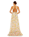 This show-stopping, floral print, floor length evening gown with sexy side cut-out detail features pleating at the bust tapering down into a hand embroidered waist followed by a full skirt with tiered detail at the hem. With elegant strappy tie-up detail at the back, this gown exposes a little sexy back for all your photos to be truly sensational from any angle! This A line dress is the perfect gown for special occasions, weddings and Summery parties back view