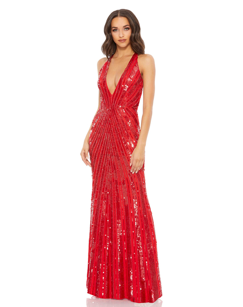 This vampy Mac Duggal, floor-length, sequinned red evening gown is a super-sexy, black-tie dress for that special occasion! With a plunging V neck and a super sexy low-back with alluring criss cross straps, this evening dress is for the daring! Perfect for prom, after-parties and weddings, you will certainly have all eyes on you! 
