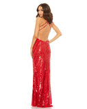 This vampy Mac Duggal, floor-length, sequinned red evening gown is a super-sexy, black-tie dress for that special occasion! With a plunging V neck and a super sexy low-back with alluring criss cross straps, this evening dress is for the daring! Perfect for prom, after-parties and weddings, you will certainly have all eyes on you! back