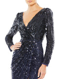 This stunning Mac Duggal elegant long-sleeved, midnight, evening gown is a beautiful, full-length evening dress with faux-wrap detail and all over sequins. With one sexy-thigh high split, dress is perfect for proms, weddings and special events!